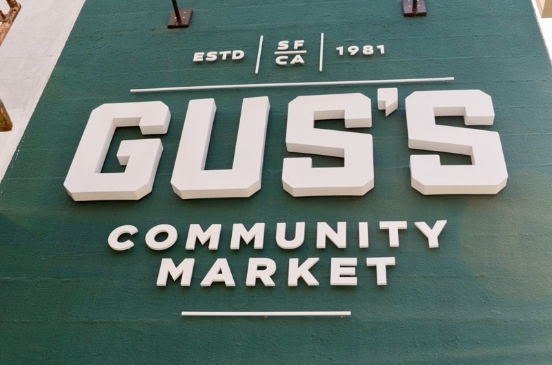 Gus's Community Market Signage