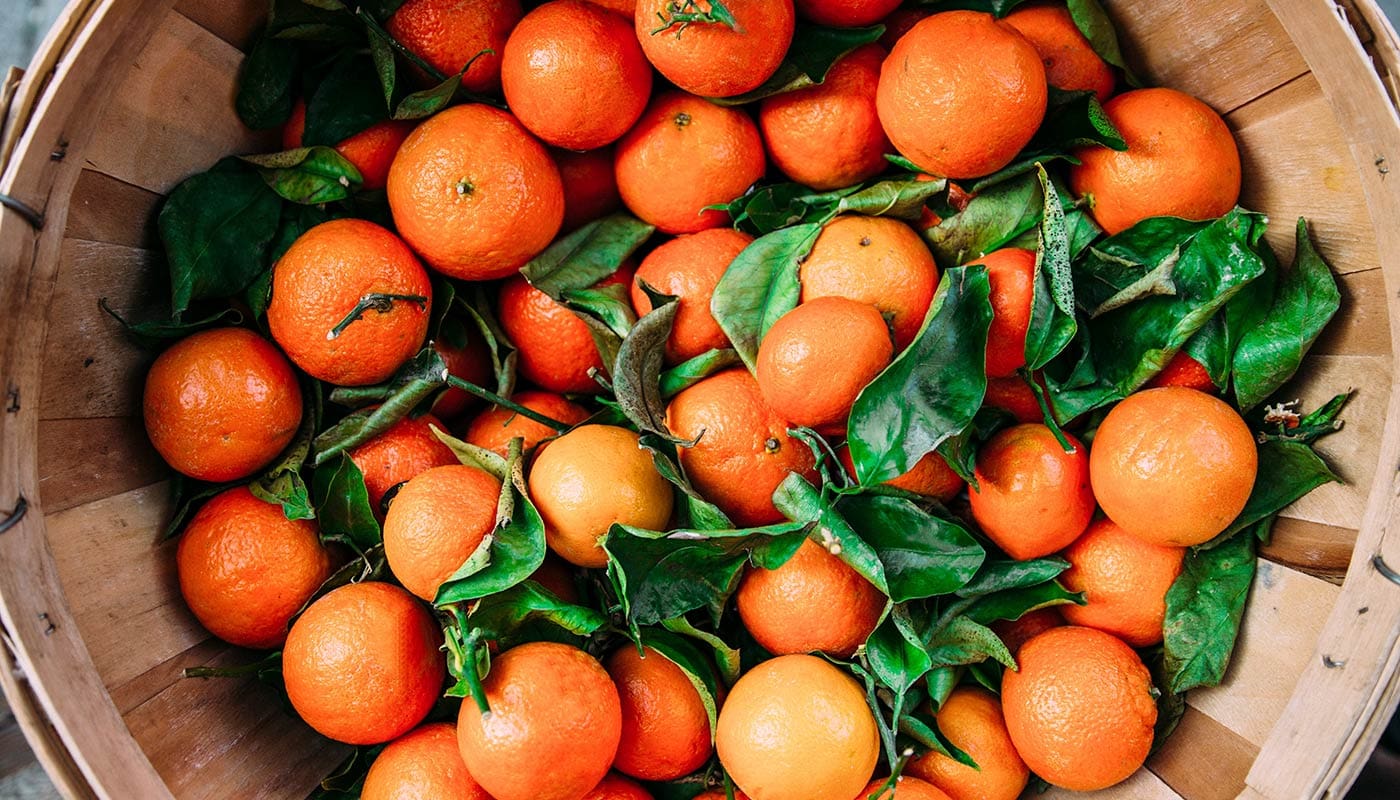 Fresh Oranges In Basket